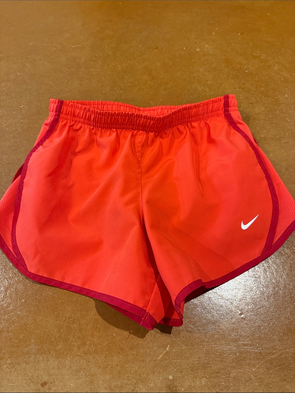 Nike kids Bright Orange Athletic Running Shorts with Dark Red Trim